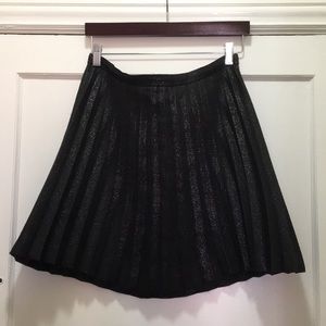 Metallic pleated skirt.